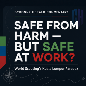 Gyronny Herald commentary graphic reading “Safe from Harm — But Safe at Work?” with “Safe” in green and “Work?” in red, alongside a compass, dotted route motif and subtle GH logo on a dark navy background.