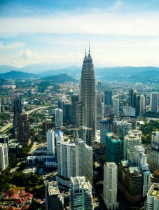 Stunning aerial view of Kuala Lumpur's skyline featuring modern skyscrapers under a clear sky. Pic. Sarowar Hussain